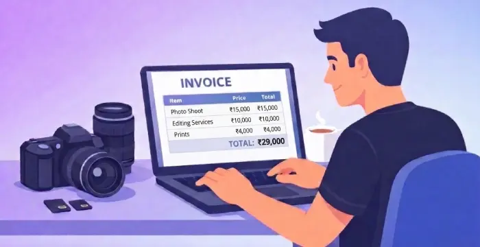 Photographer creating a digital invoice on a laptop with camera gear on the desk in a professional studio workspace.